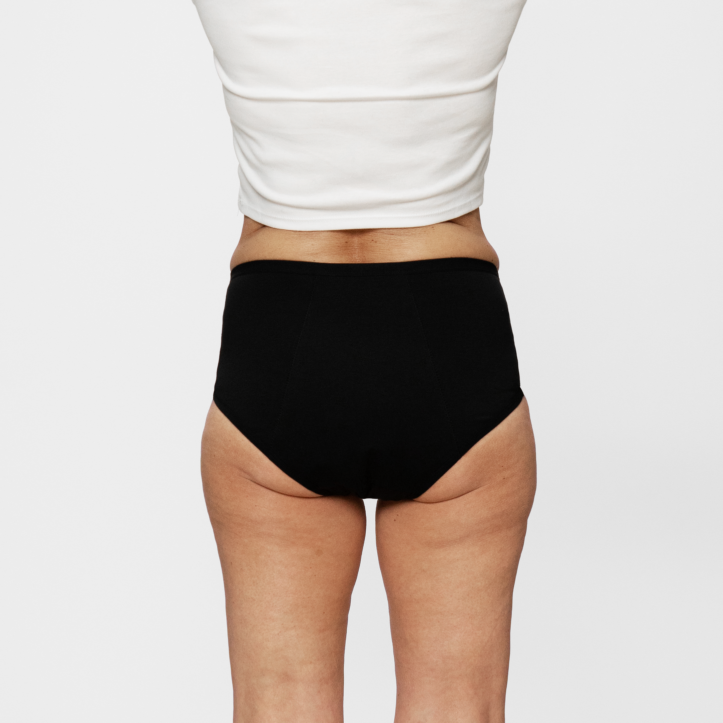 
                  
                    Inkontinenzslip LENA schwarz von hinten angezogen high waist Baumwolle mit extra Pad nachhaltig
                  
                